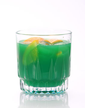 green cocktail on white background