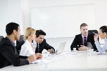 Group of young business people at meeting
