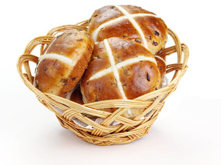 Basket with fresh hot cross buns
