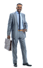 Full length portrait of a happy businessman standing