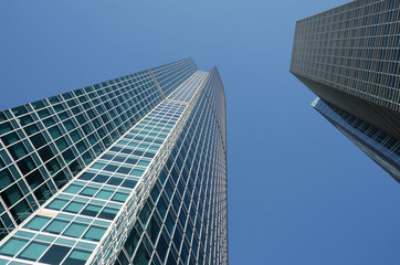 Fototapeta na wymiar Angle view of glass buildings