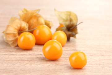 Physalis heap on wooden background