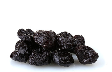 yummy dried plums isolated on white