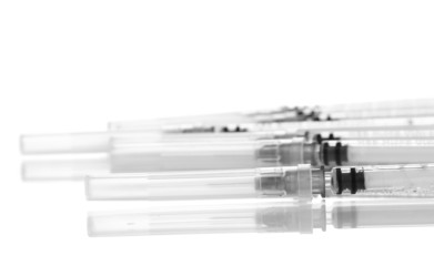 Insulin syringes isolated on white