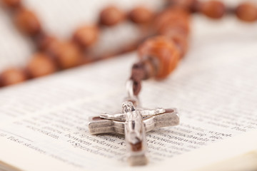 rosary on holy bible