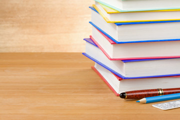 pile of books on wood