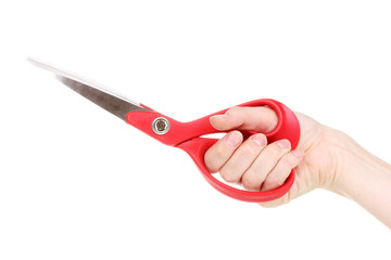 Sewing scissors in hand isolated on white