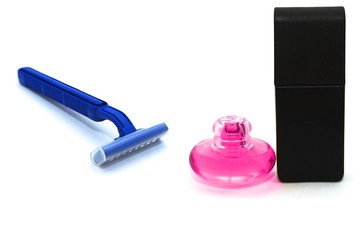 Blue razor and perfumes