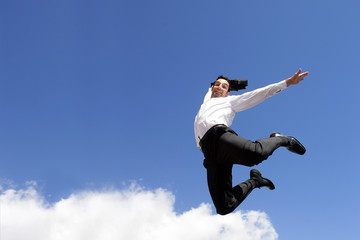 Fototapeta na wymiar businessman jumping in the air