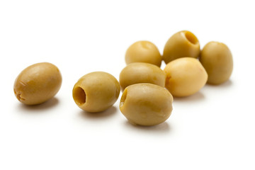 Heap of green seedless olives