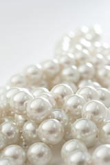 String of pearls on white