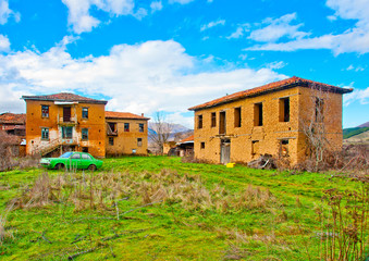 Fototapeta na wymiar Old houses in village Mavrokampos near Kastoria in Greece