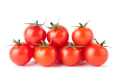 A pile of red cherry tomatoes isolated over white