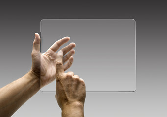 hands reaching images on a futuristic tablet