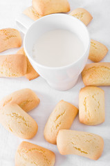 Homemade biscuits with milk cup.
