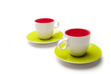 two cup and saucers on white background