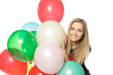 Fototapeta na wymiar Woman holding balloons against white background