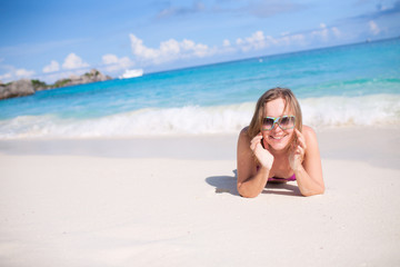 Woman Laying Down On A Beach