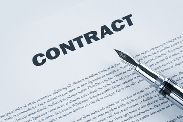 Contract with pen, toned blue