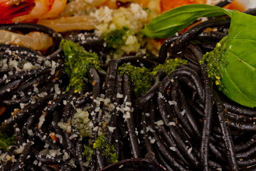 Black tagliatelle (pasta made with cuttlefish ink) with shrumps,