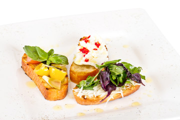 different colored Canapes on a white background