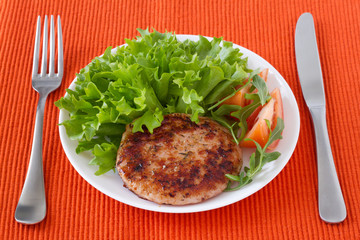 grilled turkey hamburger with salad