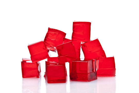 Cubes Of Red Jelly On A White Background