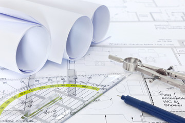 Architectural plans with drawing equipment