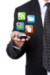 businessman holding mobile phone