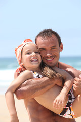 Father and daughter at the seaside