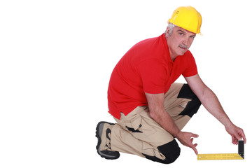 Tradesman holding a try square