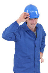 Smiling workman on white background