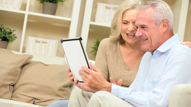 Senior Couple at Home with a Wireless Tablet