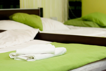 Fototapeta na wymiar white towel on the hotel bed