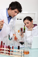 Fototapeta premium Scientists conducting an experiment