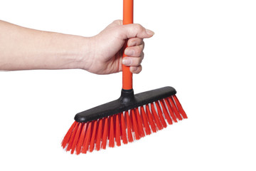 Hand and broom.