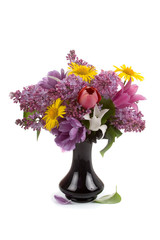 Beautiful spring bouquet with lilacs and tulips