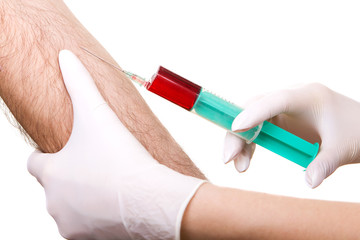 close up of blood extraction in lab