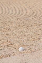 Golf ball  and sand bunker