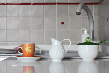 Sugar bowl,coffee cup and milk jug on the top