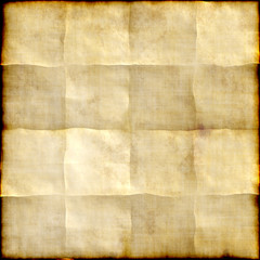 Old paper background with traces of folds