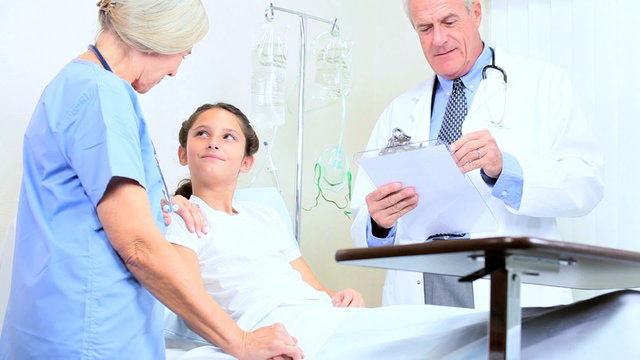 Young Girl Being Treated by Hospital Doctor