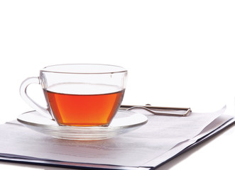 Tea flowing in cup