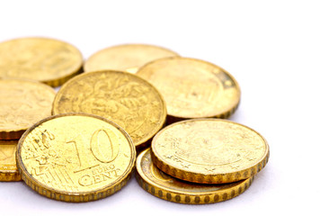 group of 10 Euro cent coins on white background
