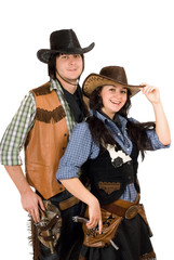 young cowboy and cowgirl. Isolated