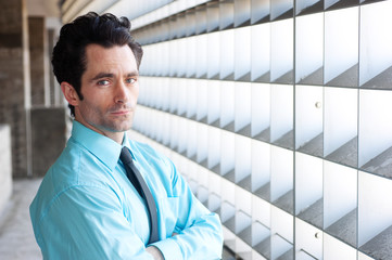 Fototapeta premium Male executive standing and thoughtful