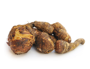 Group of taro roots on white