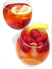 two fruit red punch cocktail drinks with raspberry