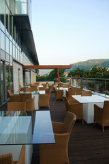 Contemporary furniture on hotel terrace in morning