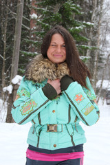 Dark-haired beautiful woman in the winter